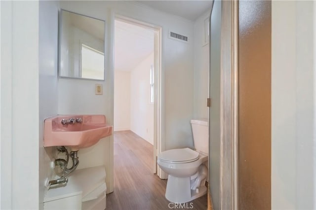 1725 Turnbull Canyon Rd, Hacienda Heights, CA 91745 - bathroom featuring a sink and wood finished floors