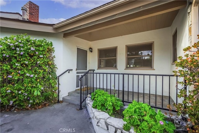 1725 Turnbull Canyon Rd, Hacienda Heights, CA 91745 - entrance to property featuring stucco siding and a chimney
