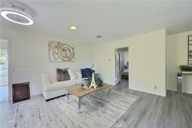 330 N Madison Ave, Monrovia, CA 91016 - living room featuring wood finished floors and heating unit