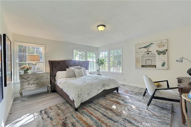 330 N Madison Ave, Monrovia, CA 91016 - bedroom featuring light wood-type flooring and multiple windows
