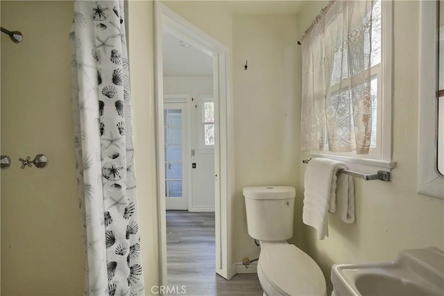 330 N Madison Ave, Monrovia, CA 91016 - full bathroom with wood finished floors and a shower with curtain