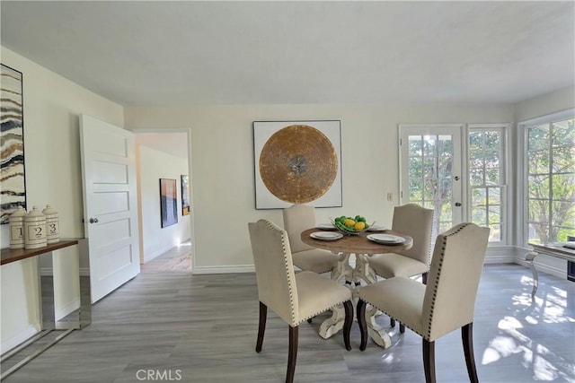330 N Madison Ave, Monrovia, CA 91016 - dining room with baseboards and wood finished floors