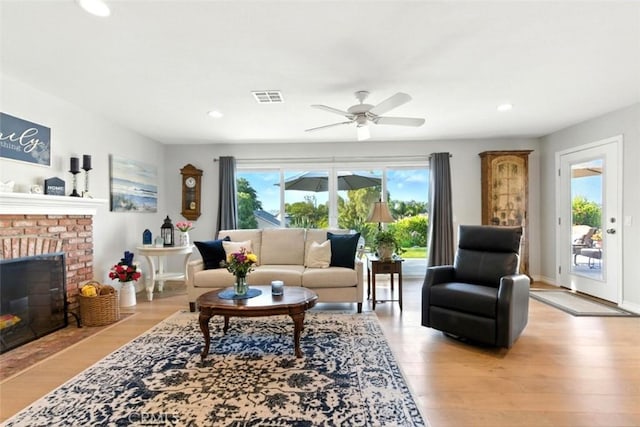 3526 Alder Pl, Chino Hills, CA 91709 - living area with a ceiling fan, recessed lighting, light wood-type flooring, and a fireplace