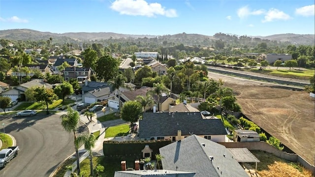 3526 Alder Pl, Chino Hills, CA 91709 - aerial overview of property's location with a mountain backdrop and nearby suburban area