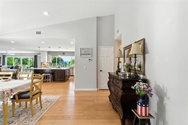 3526 Alder Pl, Chino Hills, CA 91709 - dining space featuring light wood-type flooring, recessed lighting, high vaulted ceiling, and ceiling fan