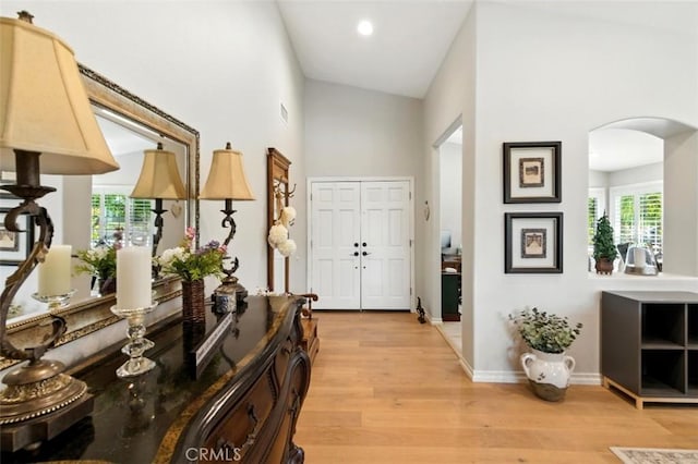 3526 Alder Pl, Chino Hills, CA 91709 - entrance foyer featuring arched walkways, light wood-style floors, a towering ceiling, and recessed lighting