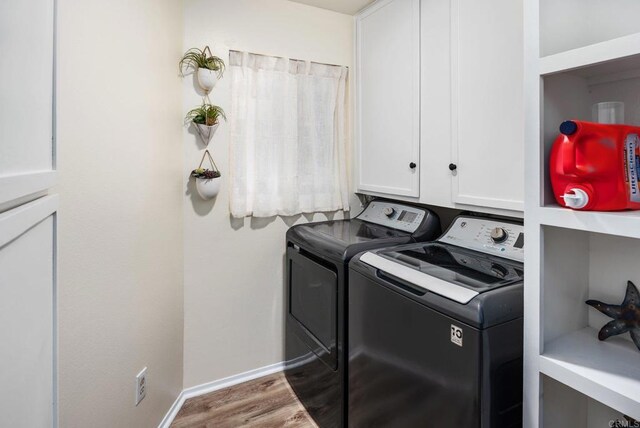 10518 Moon View Way, Escondido, CA 92026 - laundry room with cabinet space, independent washer and dryer, and wood finished floors