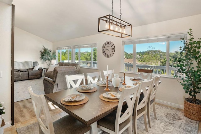 10518 Moon View Way, Escondido, CA 92026 - dining area with plenty of natural light, lofted ceiling, and light wood finished floors