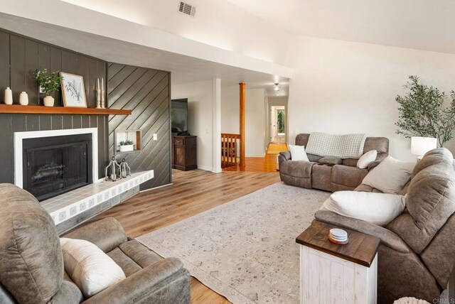 10518 Moon View Way, Escondido, CA 92026 - living area featuring wood finished floors and a fireplace