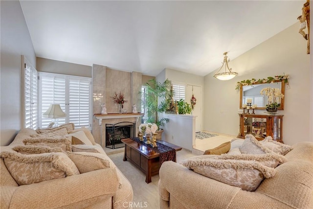 9909 Merced River Ave, Fountain Valley, CA 92708 - living area featuring vaulted ceiling and a fireplace