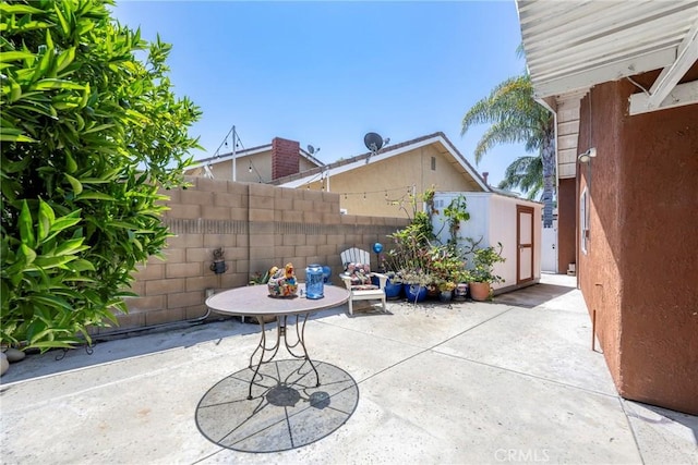 9909 Merced River Ave, Fountain Valley, CA 92708 - view of patio / terrace featuring a shed