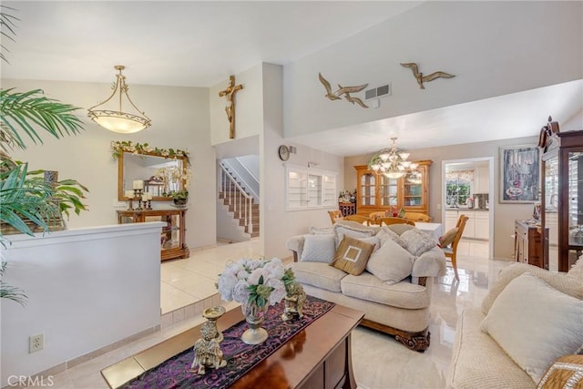 9909 Merced River Ave, Fountain Valley, CA 92708 - living area featuring stairs, a chandelier, and light tile patterned floors
