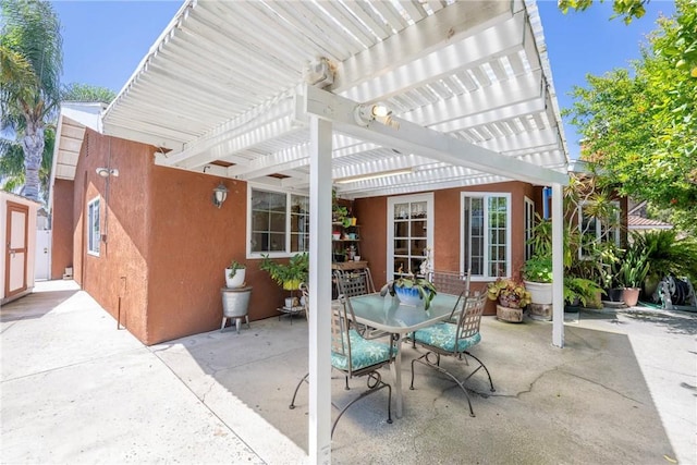 9909 Merced River Ave, Fountain Valley, CA 92708 - view of patio / terrace featuring a pergola, outdoor dining area, and a shed