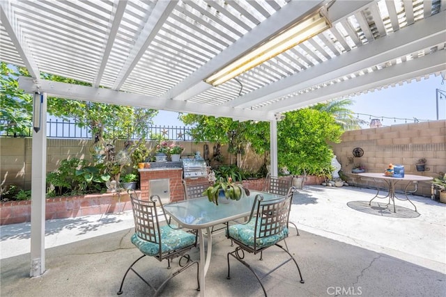 9909 Merced River Ave, Fountain Valley, CA 92708 - fenced backyard featuring outdoor dining space, a patio, exterior kitchen, and a pergola