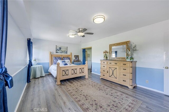 9909 Merced River Ave, Fountain Valley, CA 92708 - bedroom with light wood finished floors and a ceiling fan