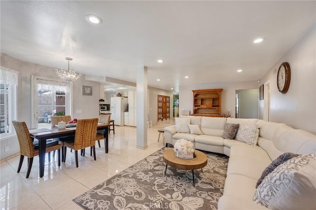 9909 Merced River Ave, Fountain Valley, CA 92708 - living room featuring a chandelier, light tile patterned floors, and recessed lighting
