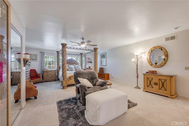 9909 Merced River Ave, Fountain Valley, CA 92708 - living area with light carpet, a ceiling fan, and decorative columns