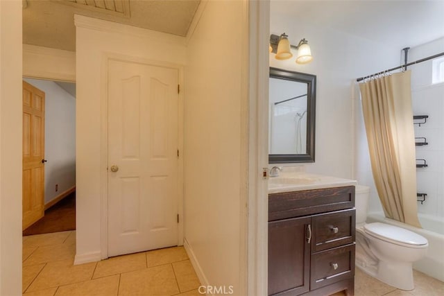 246 E Shasta St, Orland, CA 95963 - bathroom featuring tile patterned flooring, vanity, and shower / bath combo with shower curtain