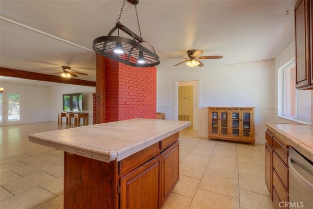 246 E Shasta St, Orland, CA 95963 - kitchen featuring ceiling fan, tile counters, stainless steel dishwasher, and light tile patterned floors