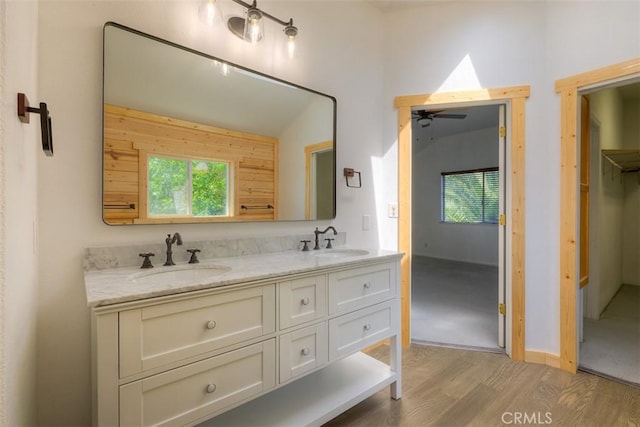 246 E Shasta St, Orland, CA 95963 - full bath featuring wood finished floors, ceiling fan, and double vanity