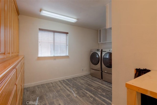 246 E Shasta St, Orland, CA 95963 - laundry area with cabinet space, washer and clothes dryer, and dark wood-type flooring
