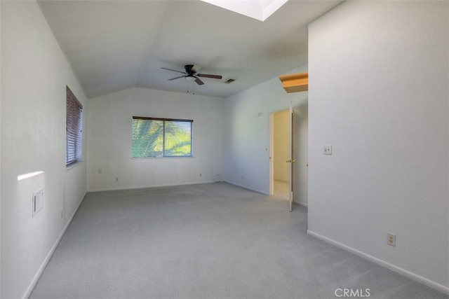 246 E Shasta St, Orland, CA 95963 - unfurnished room featuring a ceiling fan, light carpet, lofted ceiling, and a skylight