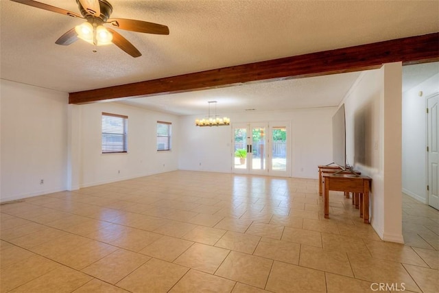 246 E Shasta St, Orland, CA 95963 - unfurnished room featuring beam ceiling, a textured ceiling, a chandelier, a ceiling fan, and light tile patterned floors