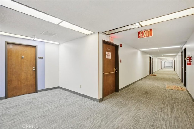 18900 Delaware St Unit 214, Huntington Beach, CA 92648 - hallway with carpet