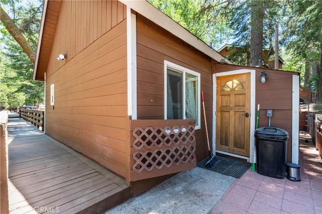 32135 W Dr, Running Springs, CA 92382 - view of exterior entry with a deck