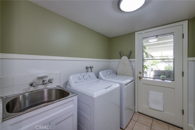 2640 Tenaya Way, Fresno, CA 93711 - laundry area featuring light tile patterned floors and separate washer and dryer