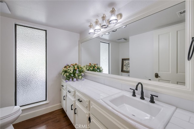 2640 Tenaya Way, Fresno, CA 93711 - bathroom with vanity and wood finished floors