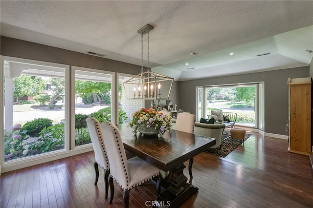 2640 Tenaya Way, Fresno, CA 93711 - dining space with a chandelier, wood-type flooring, and a textured ceiling
