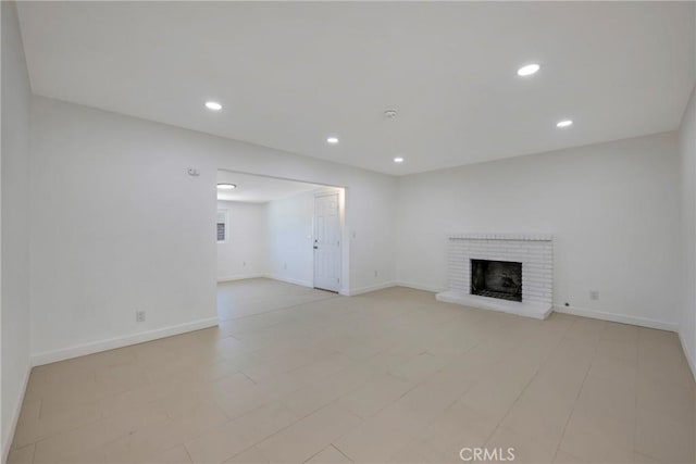 8888 Patrero St, Riverside, CA 92503 - unfurnished living room with recessed lighting and a fireplace