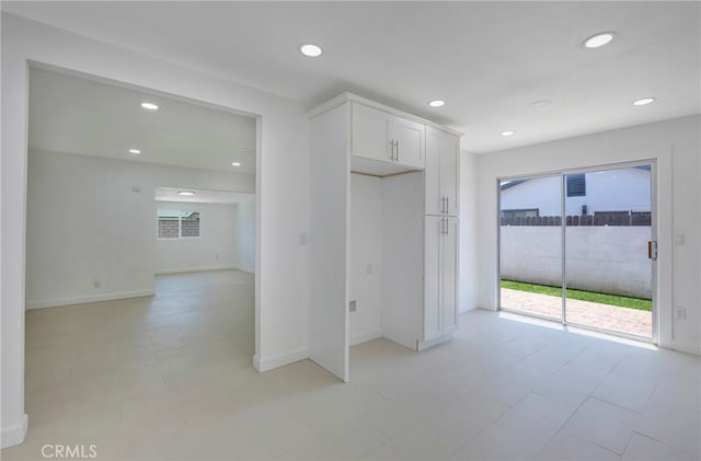 8888 Patrero St, Riverside, CA 92503 - kitchen featuring white cabinetry and recessed lighting