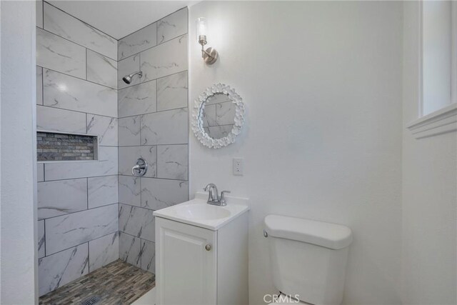 8888 Patrero St, Riverside, CA 92503 - full bathroom featuring vanity and a tile shower