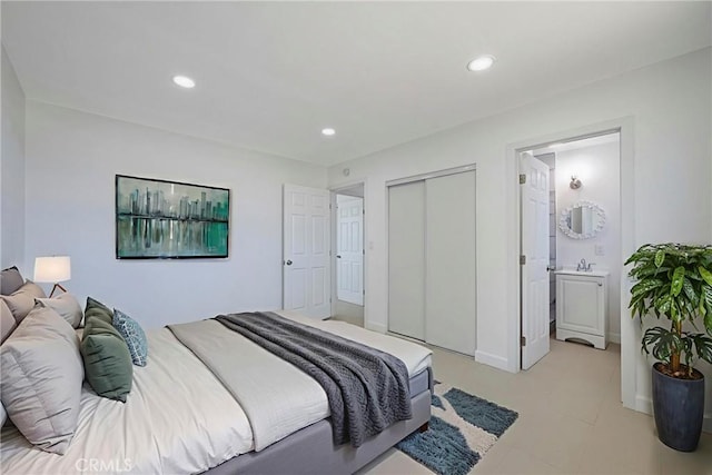 8888 Patrero St, Riverside, CA 92503 - bedroom featuring recessed lighting, a closet, ensuite bath, and light tile patterned floors