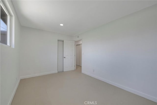 8888 Patrero St, Riverside, CA 92503 - empty room with baseboards and recessed lighting