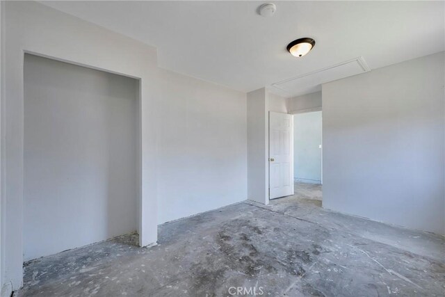8888 Patrero St, Riverside, CA 92503 - unfurnished room with attic access, unfinished concrete floors, and a smoke detector