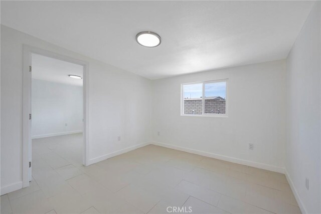 8888 Patrero St, Riverside, CA 92503 - spare room with baseboards