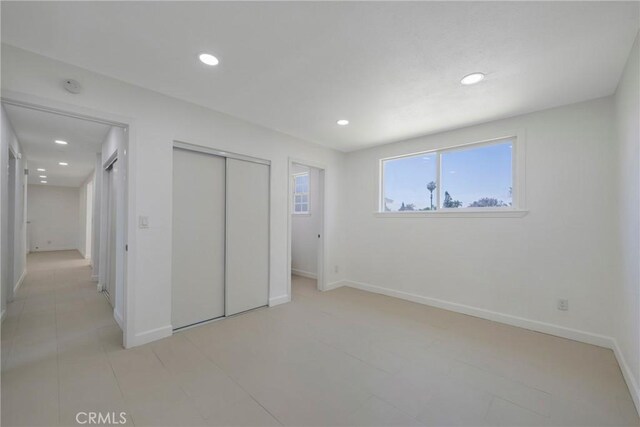8888 Patrero St, Riverside, CA 92503 - unfurnished bedroom with recessed lighting and a closet