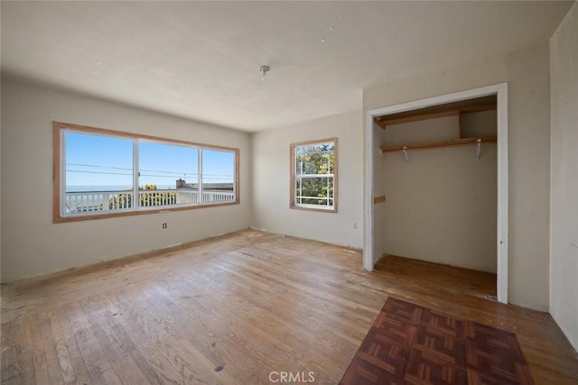 1799 Saint Thomas Ave, Cambria, CA 93428 - unfurnished bedroom featuring wood finished floors and a closet