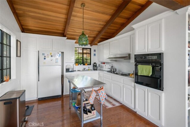 1799 Saint Thomas Ave, Cambria, CA 93428 - kitchen featuring freestanding refrigerator, oven, wood ceiling, dark wood finished floors, and white cabinets