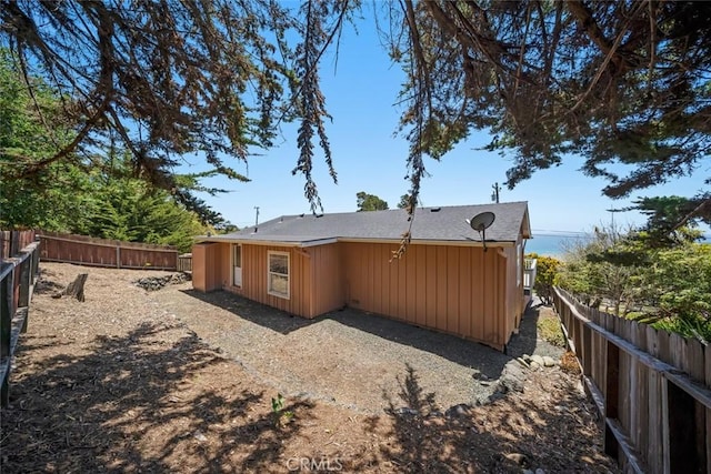 1799 Saint Thomas Ave, Cambria, CA 93428 - back of property featuring a fenced backyard and board and batten siding