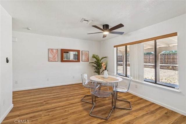 27363 Azurite Rd, Barstow, CA 92311 - dining area featuring wood finished floors and a ceiling fan