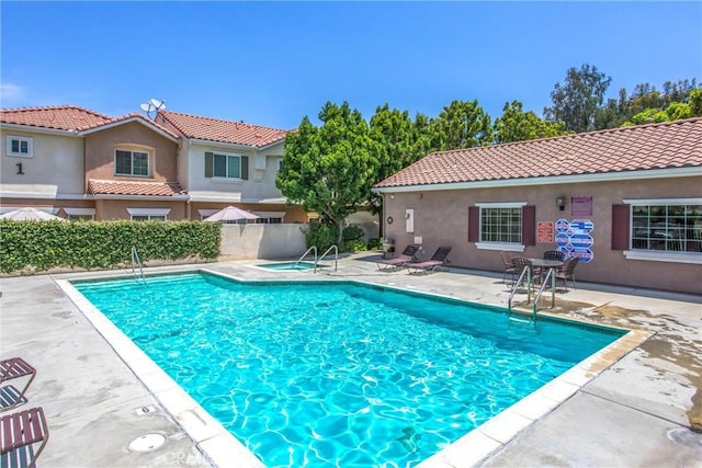 93 Kansas St Unit 205, Redlands, CA 92373 - community pool featuring a patio and a community hot tub