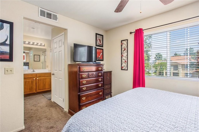 93 Kansas St Unit 205, Redlands, CA 92373 - carpeted bedroom featuring ensuite bathroom and a ceiling fan