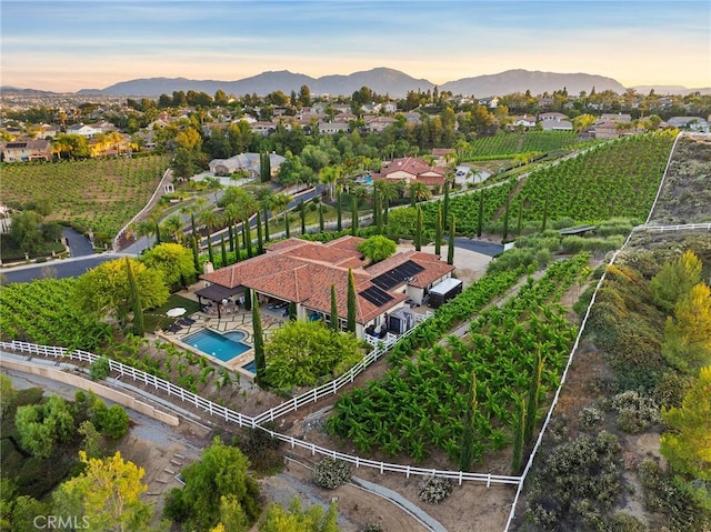 33260 Susan Grace Ct, Temecula, CA 92592 - aerial view at dusk of view of pool, agricultural area, and a mountain view