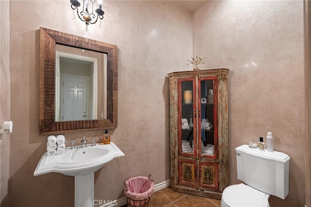 33260 Susan Grace Ct, Temecula, CA 92592 - half bathroom featuring toilet and tile patterned floors