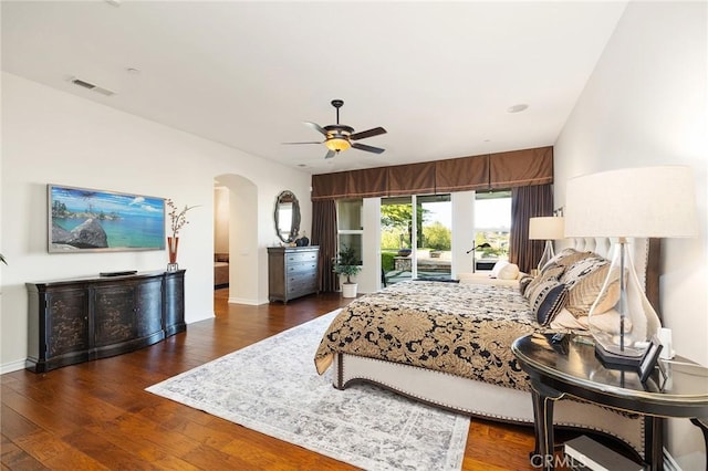 33260 Susan Grace Ct, Temecula, CA 92592 - bedroom featuring arched walkways, access to exterior, wood finished floors, and a ceiling fan