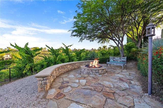 33260 Susan Grace Ct, Temecula, CA 92592 - view of patio featuring an outdoor fire pit